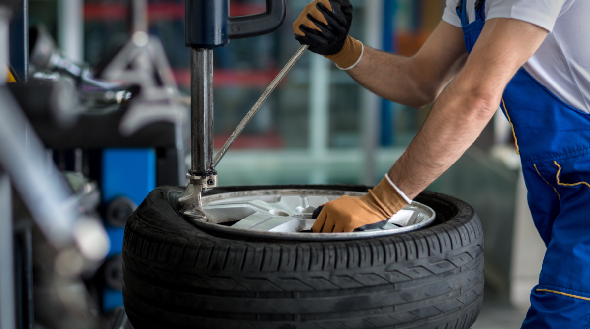 Man Working on a Tire