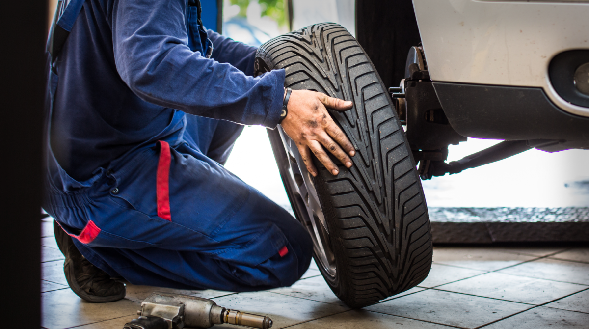 Man Changing a Tire